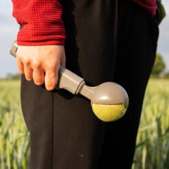 Kompact 9 Retractable Dog Ball Launcher 25 Kompact 9 Retractable Dog Ball Launcher -Wahl Dogs Shop product image in situ hold